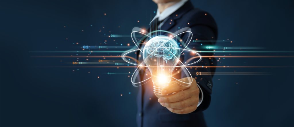 Businessman holding light bulb and brain inside, Idea and imagination, Creative and inspiration, Science innovation with network connection, Solution analysis and development, Innovative technology